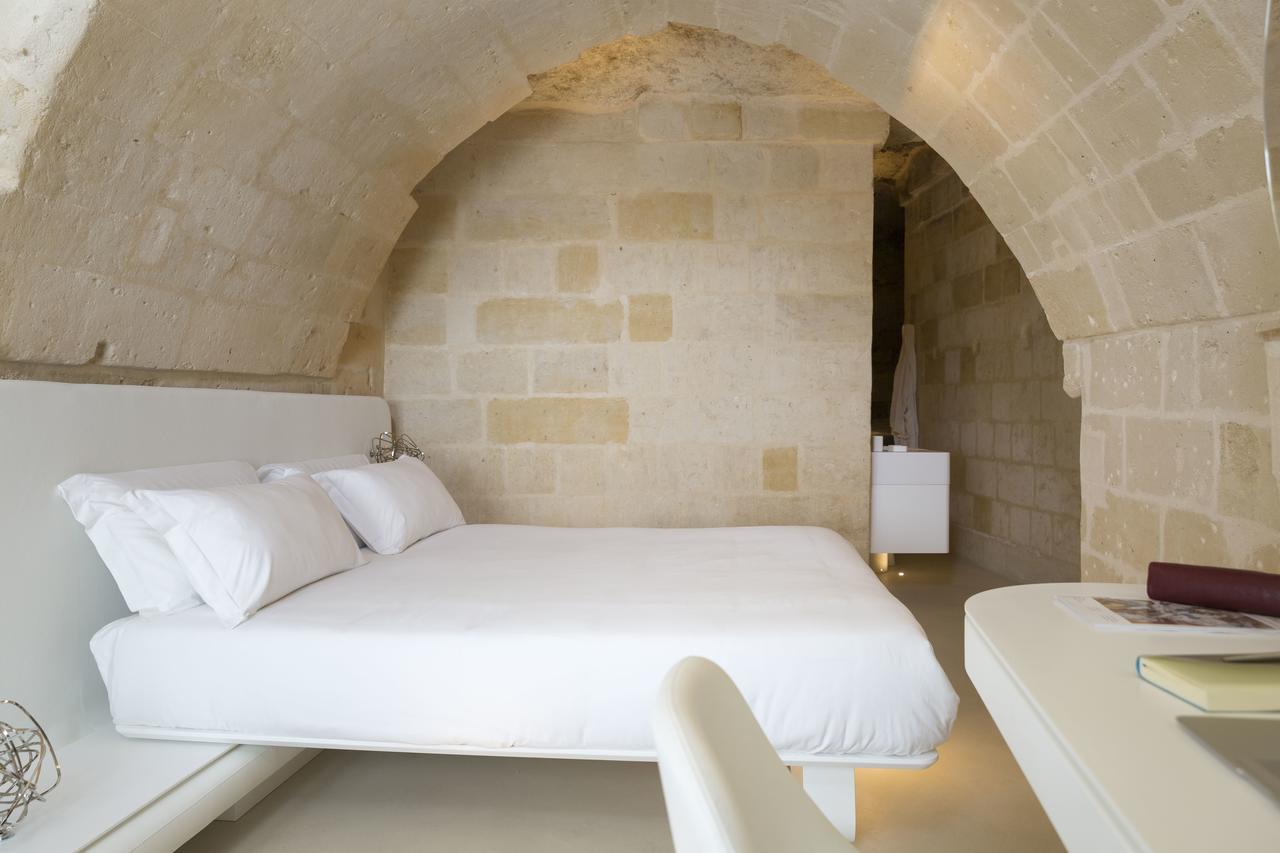 Aquatio Cave Luxury Hotel & Spa Matera Exterior photo A room at the hotel
