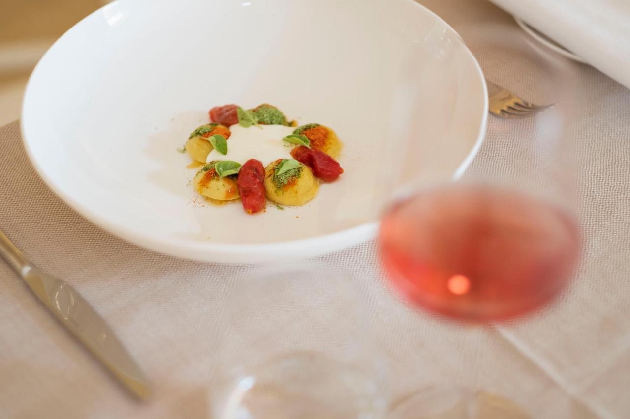 Aquatio Cave Luxury Hotel & Spa Matera Exterior photo A dish at the restaurant